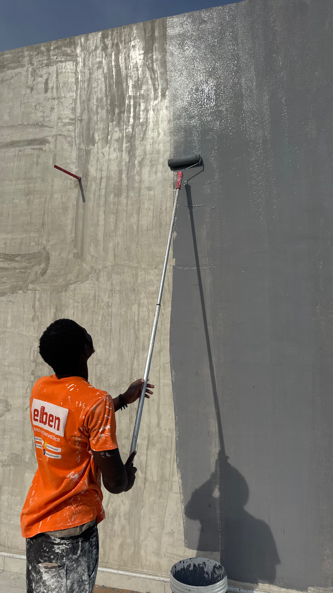 Elben crew finishing exterior walls